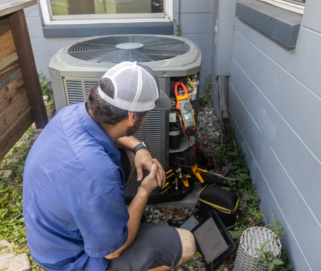Apex Heating And Air technician working